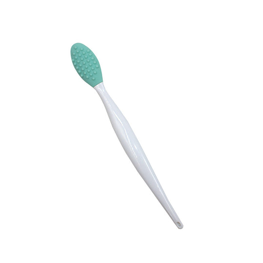 Silicone nose cleaning brush.