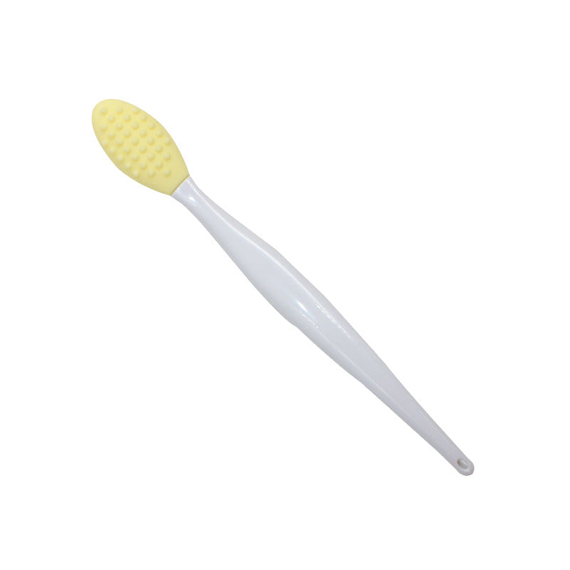 Silicone nose cleaning brush.