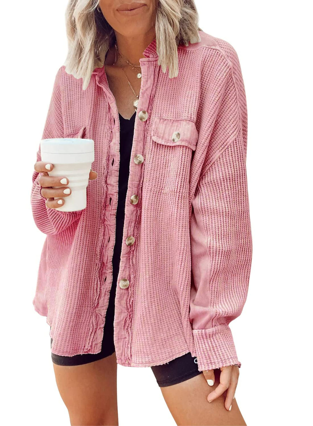 Fashionable women's button-up shirt jacket with lapel collar, long sleeves, and blouse-style top.
