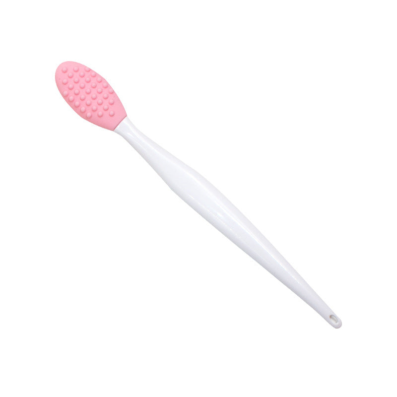 Silicone nose cleaning brush.