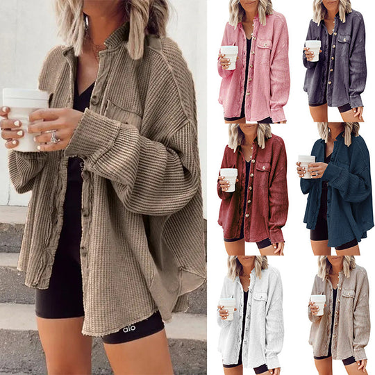 Fashionable women's button-up shirt jacket with lapel collar, long sleeves, and blouse-style top.