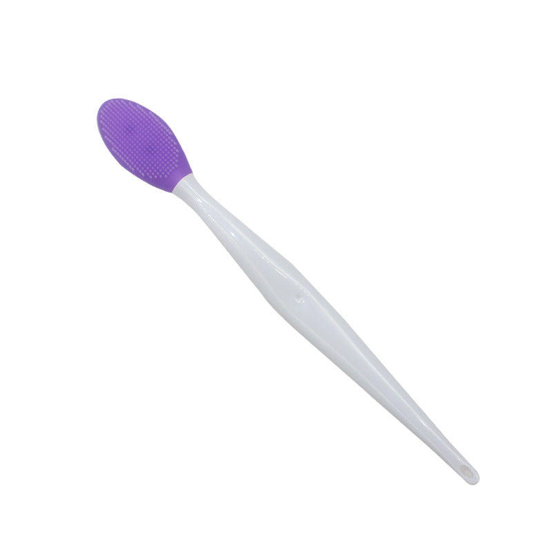 Silicone nose cleaning brush.