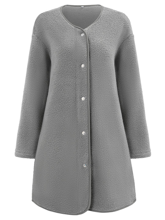 Long-sleeved women's coat with a single-breasted design and a round neck.