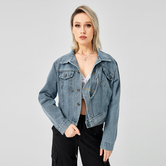 Fashionable women's long sleeve denim jacket with a stylish design.
