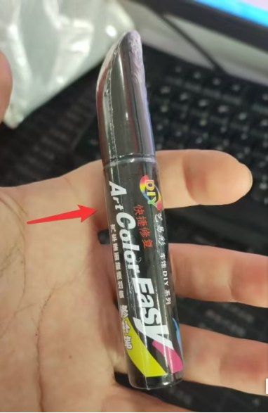 Scratch repair car paint artifact