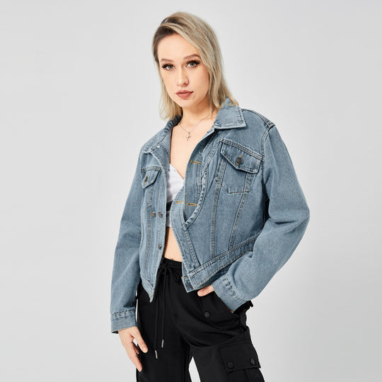 Fashionable women's long sleeve denim jacket with a stylish design.